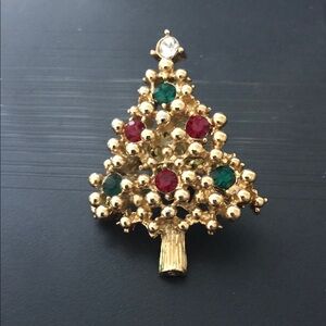 Avon Gold-Tone Christmas Tree Brooch with Red, Green & Clear Stones